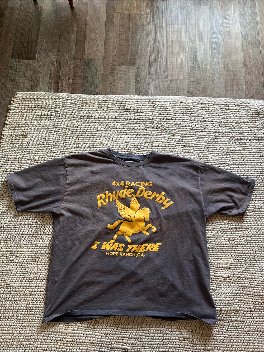 Rhude Dark Gray Short Sleeve Tee with Yellow Derby Graphic